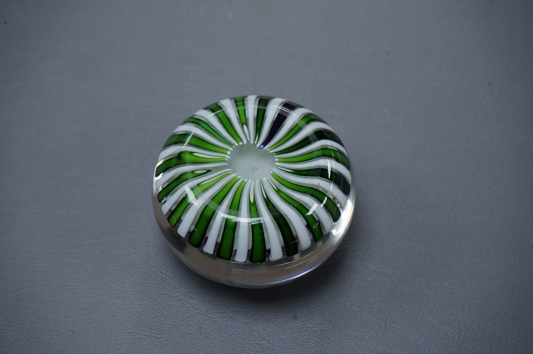 A Clichy concentric millefiori paperweight, green and white - striped basket, 7.5cm wide